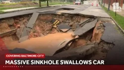 Car fell into massive sinkhole early Saturday morning
