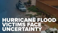 Hurricane flood victims face uncertainty over state, federal aid
