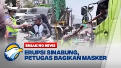 BREAKING NEWS - CEGAH ISPA PASCA ERUPSI GUNUNG SINABUNG, PETUGAS BAGIKAN MASKER