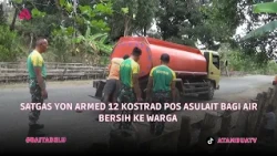SATGAS YON ARMED 12 KOSTRAD POS ASULAIT BAGI AIR BERSIH KE WARGA