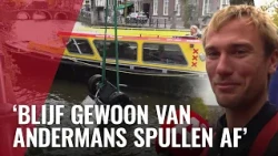 Autootje in de gracht geduwd