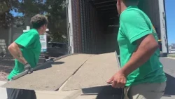 Employees for moving companies do their best to keep cool in hot Colorado temps