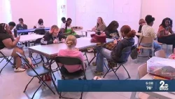Baltimore City workers visit YouthWorks participants on site