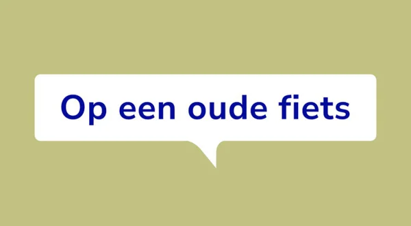 Op een oude fiets