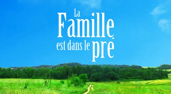 La famille est dans le pré
