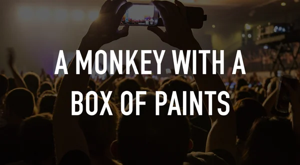 A Monkey With a Box of Paints