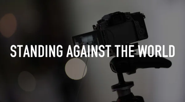 Standing Against the World