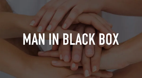 Man in Black Box